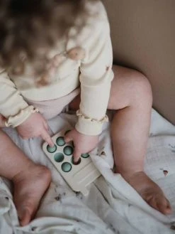 Pop-it Téléphone - MUSHIE Rose - Mushie 6 Pop-it Téléphone - MUSHIE Rose - Mushie -Hape Boutique pop it telephone mushie 2